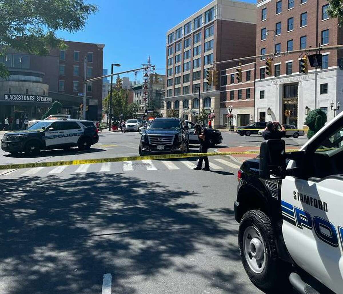 Two Norwalk residents were injured Wednesday when they were struck by a car at Bedford and Broad streets in Stamford, police said.