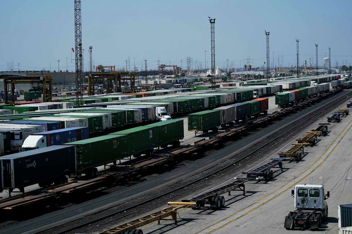 Freight train cars sit in a Union Pacific rail yard Wednesday in Commerce, Calif. President Joe Biden said Thursday that a tentative railway labor agreement has been reached, averting a potentially devastating strike.