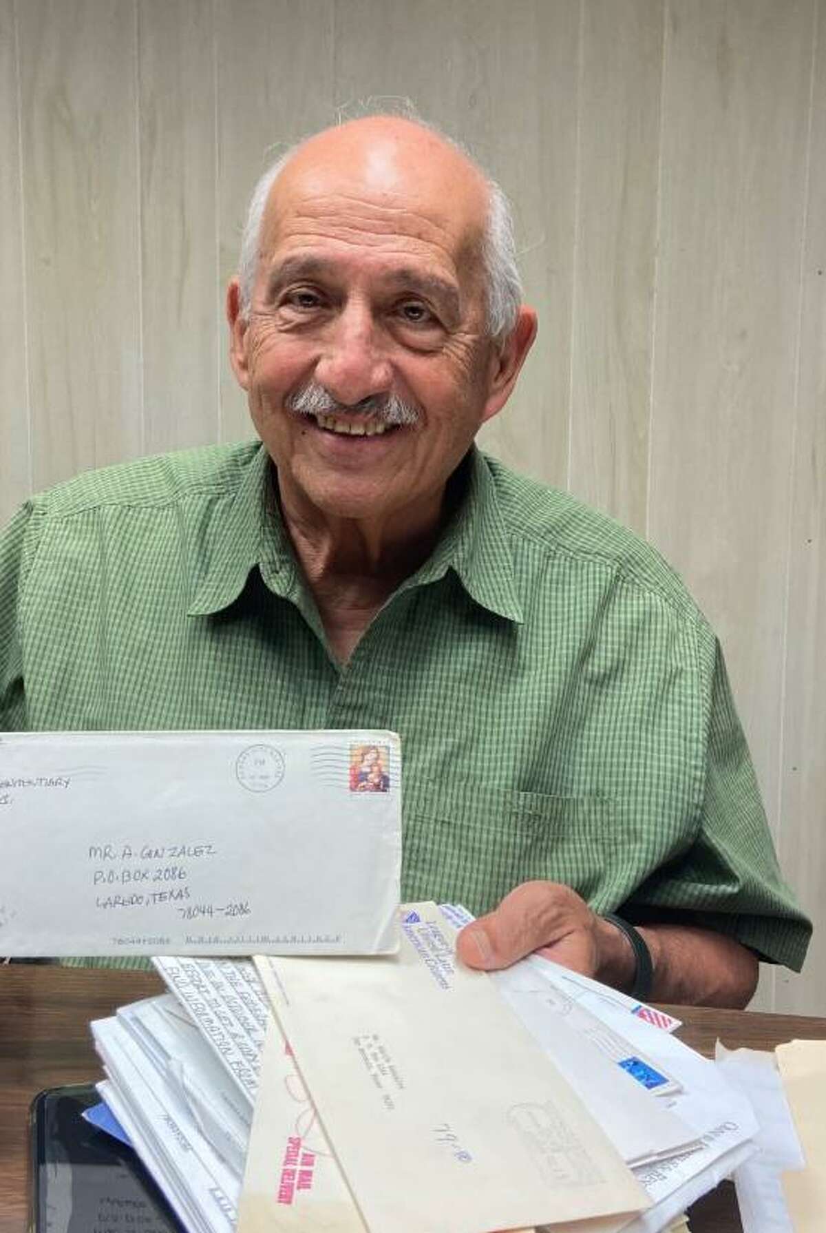 Adolfo L. Gonzalez holds one of his letters from Ramiro “Ramsey” Muniz, a gubernatorial candidate in 1972.