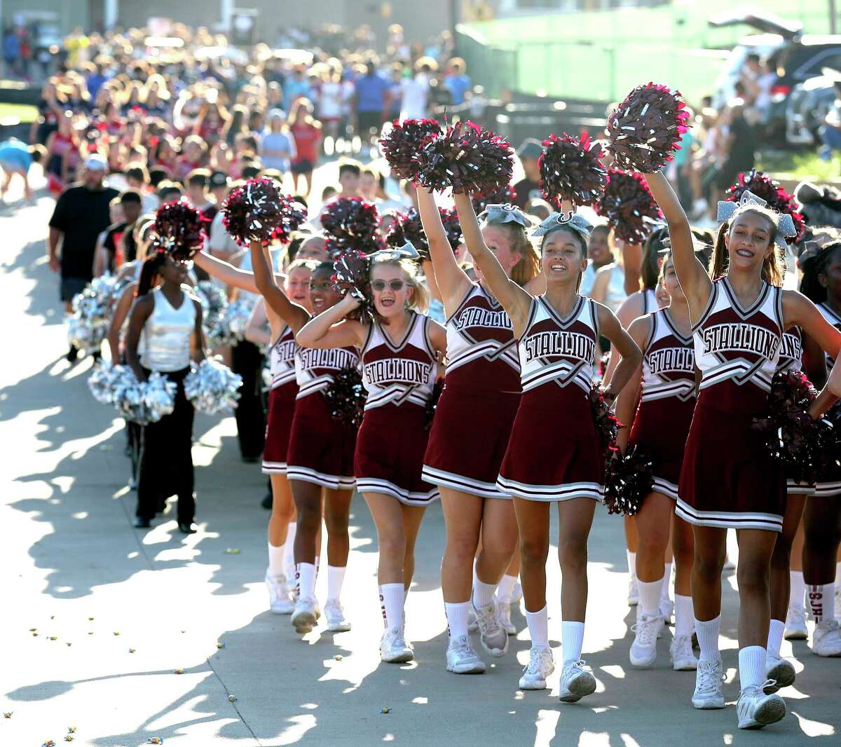 Conroe High Tigers roar into with annual parade