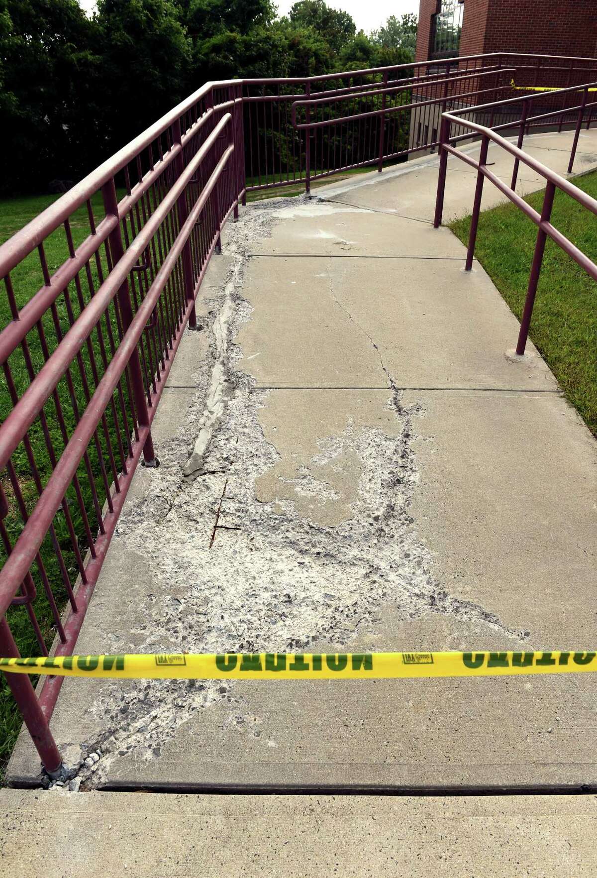 A cracked entrance ramp at Seth Haley Elementary School in West Haven photographed on September 15, 2022.