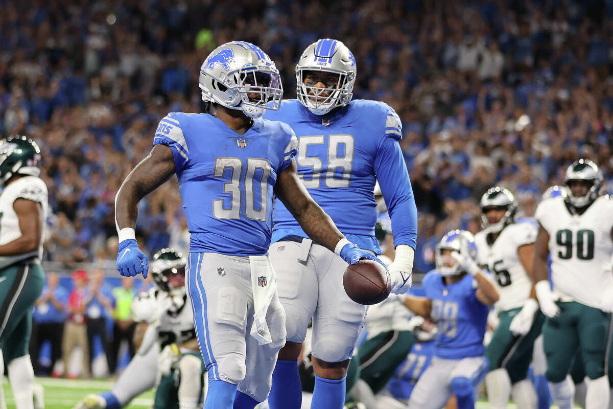 DETROIT, MICHIGAN - SEPTEMBER 11: Jamaal Williams #30 of the Detroit Lions celebrates a touchdown agains the Philadelphia Eagles at Ford Field on September 11, 2022 in Detroit, Michigan. (Photo by Gregory Shamus/Getty Images)