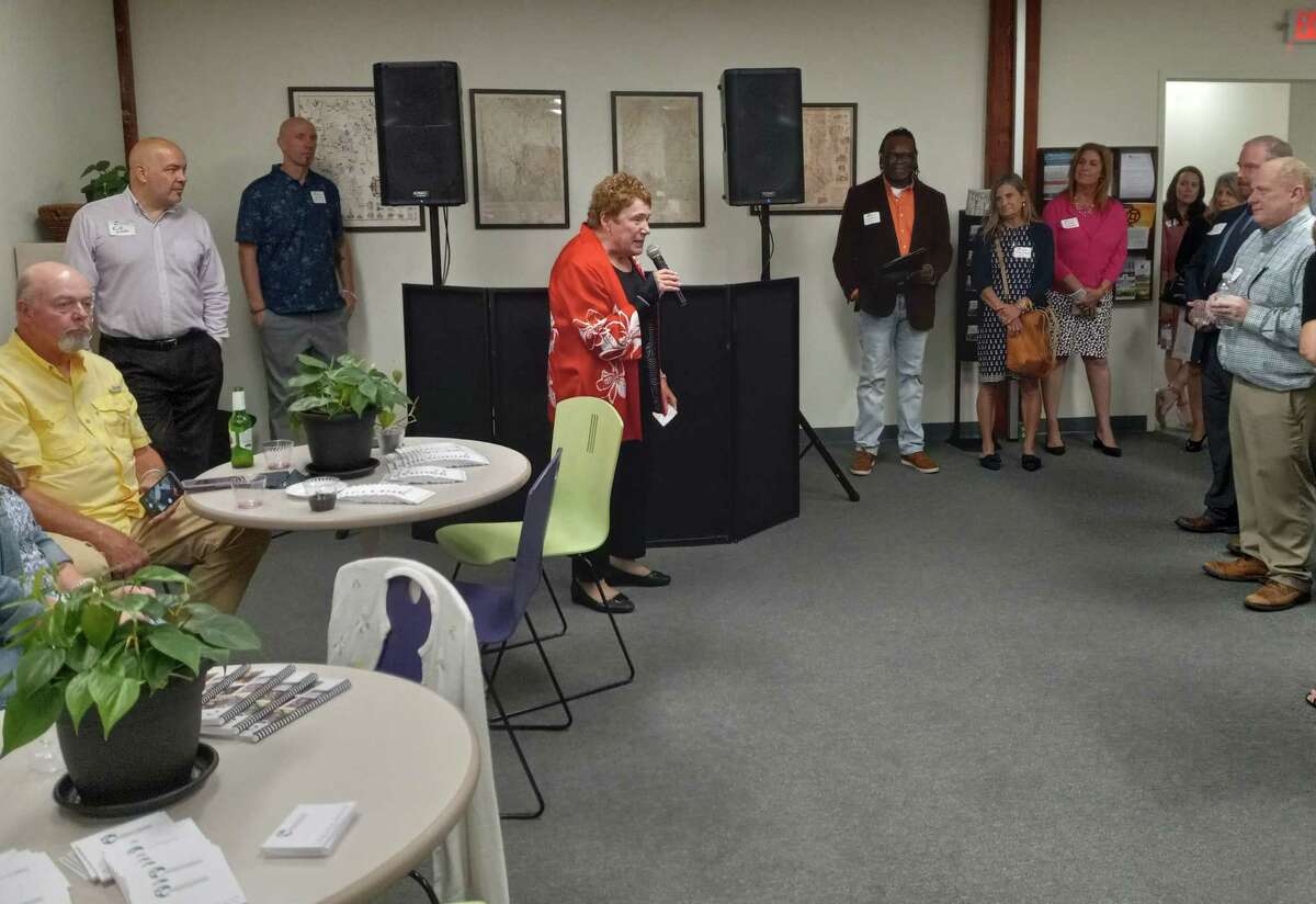 CEO JoAnn Ryan of the Northwest CT Chamber of Commerce speaks to her guests during an open house at the chamber’s new offices at 59 Field St. in Torrington.