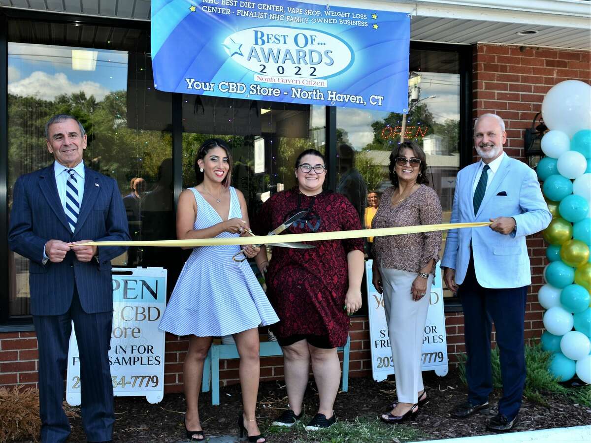 GRAND REOPENING: From left, North Haven First Selectman Mike Freda, owner Vanessa Moreno, Lindsey Rispoli, Betty Cordoba-Galarza and Quinnipiac Chamber of Commerce Executive Director Ray Andrewsen join for a ribbon-cutting marking the grand reopening of Your CBD Store at 75 Washington Ave. earlier this month. For information, visit www.getsunmed.com or call 203-234-7779.