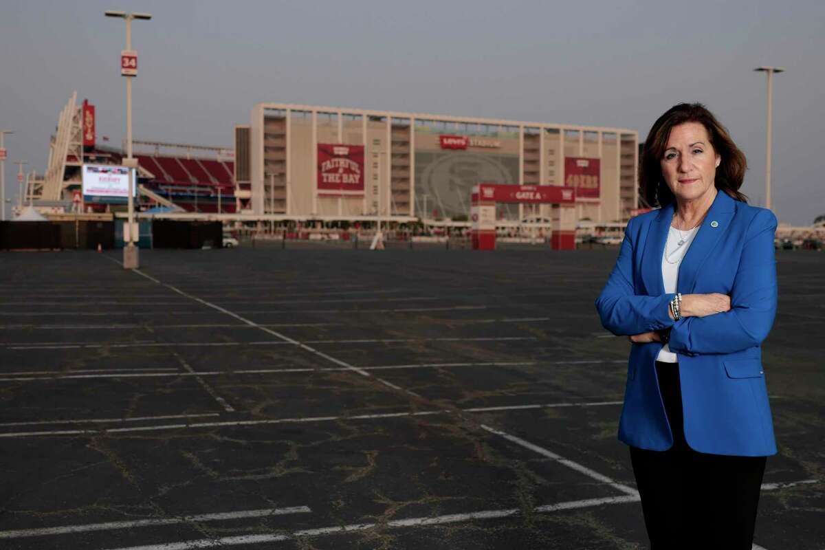Santa Clara Mayor Lisa Gillmor, shown outside Levi’s Stadium in August 2021, is running for re-election against Anthony Becker, a City Council member.