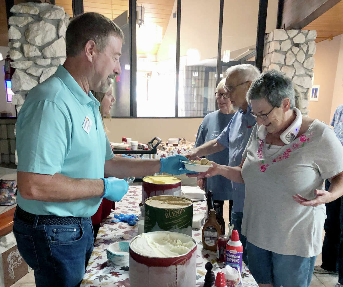 In celebration of Senior Center month, the Wagoner Community Center in Manistee held an ice cream social on Wednesday afternoon. Celebrity ice cream scoopers Jeff Dontz, Rachel Nelson and Marie Linn shared the sweetness with the seniors who attended. 