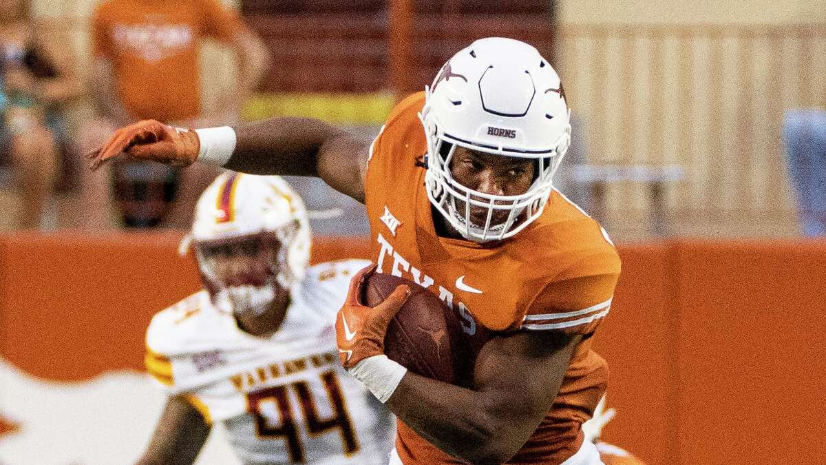 Texas running back Bijan Robinson runs during an NCAA college football game against Louisiana-Monroe, Saturday, Sept. 3, 2022, in Austin, Texas. (AP Photo/Michael Thomas)