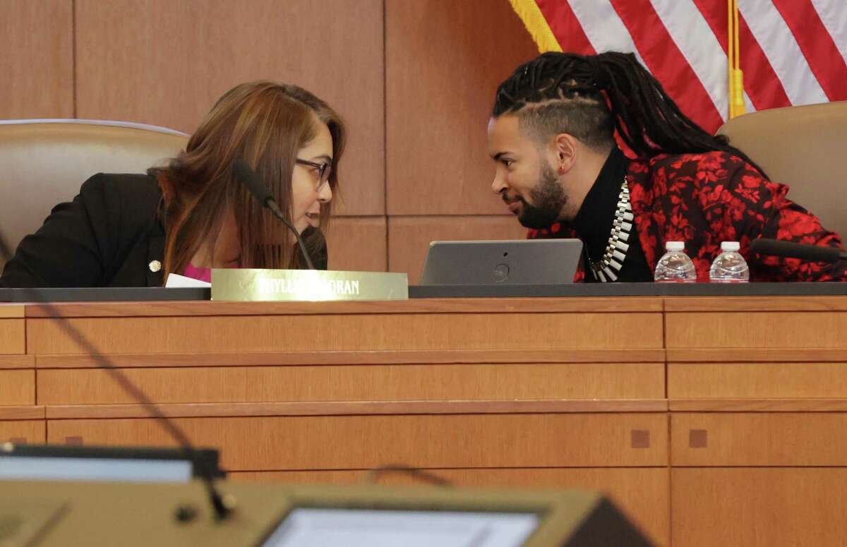 District 3 Councilperson Phyllis Viagran (left) and District 2 Councilman Jalen McKee-Rodriguez confer as City Council meets to discuss and vote on the city's new annual budget, totaling $3.4 billion, on Thursday, Sept. 15, 2022. The main highlights included city property tax relief; large wage increases for city employees to stem the tide of people leaving and fill vacancies; police resources; and what to do with an extra $50 to $75 million in revenue the city takes from CPS Energy.