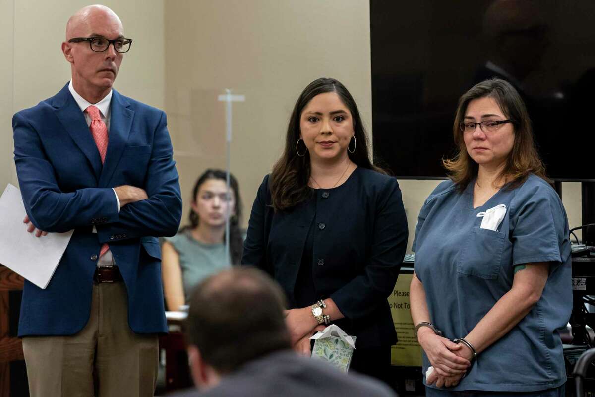 Krystal Margaret Jessica Rodriguez, right, listens to victim impact statements during her sentencing Thursday in the 399th District Court. She pleaded guilty to murder for fatally shooting her ex-husband, Jared Rodriguez, in December.