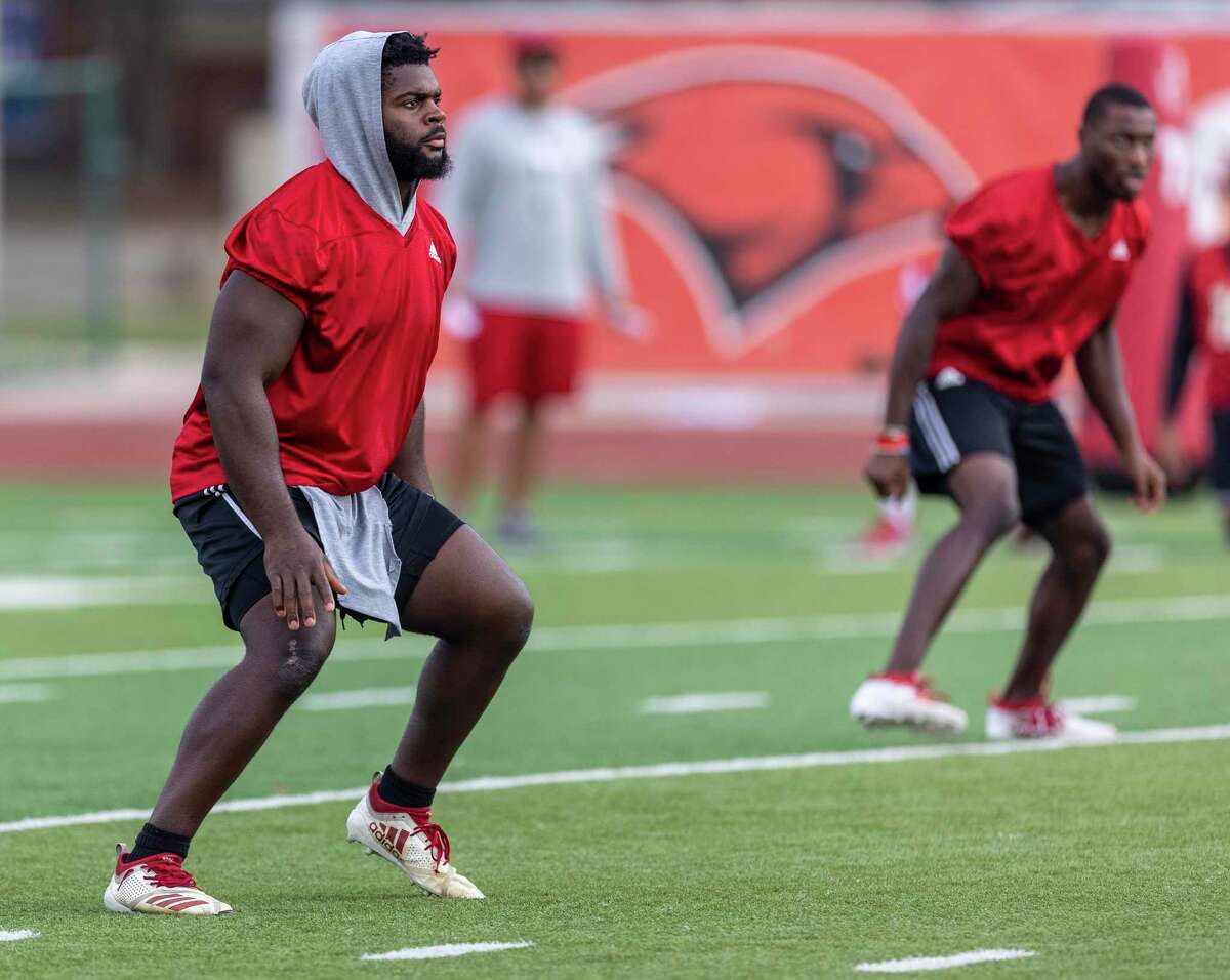 UIW’s Kelechi Anyalebechi runs through drills Thursday morning during the Cardinals’ practice in advance of their Saturday matchup against Prairie View A&M.
