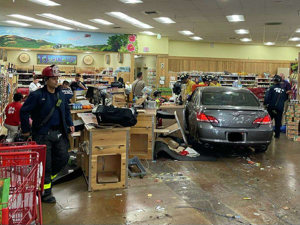 Crews respond after a car crashed into a Trader Joe’s in Castro Valley on Thursday.