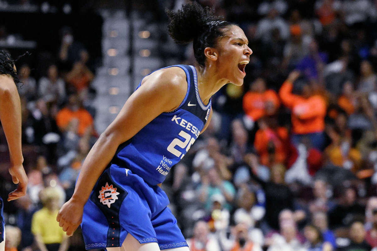 Connecticut Sun's Alyssa Thomas reacts during the first half in Game 3 of a WNBA basketball final playoff series against the Las Vegas Aces, Thursday, Sept. 15, 2022, in Uncasville, Conn. (AP Photo/Jessica Hill)