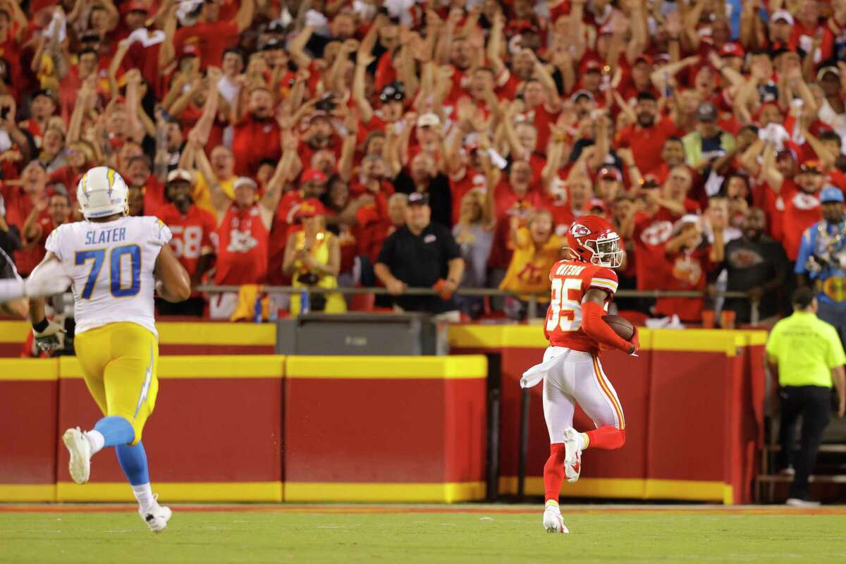 KANSAS CITY, MISSOURI - SEPTEMBER 15: Jaylen Watson #35 of the Kansas City Chiefs returns an interception 99-yards for a touchdown during the fourth quarter against the Los Angeles Chargers at Arrowhead Stadium on September 15, 2022 in Kansas City, Missouri. (Photo by David Eulitt/Getty Images)