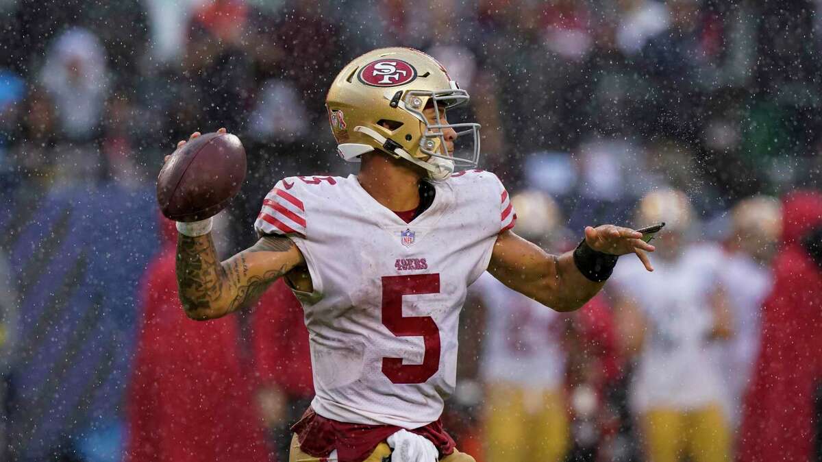 San Francisco 49ers' Trey Lance throws during the second half of an NFL football game against the Chicago Bears Sunday, Sept. 11, 2022, in Chicago. (AP Photo/Nam Y. Huh)