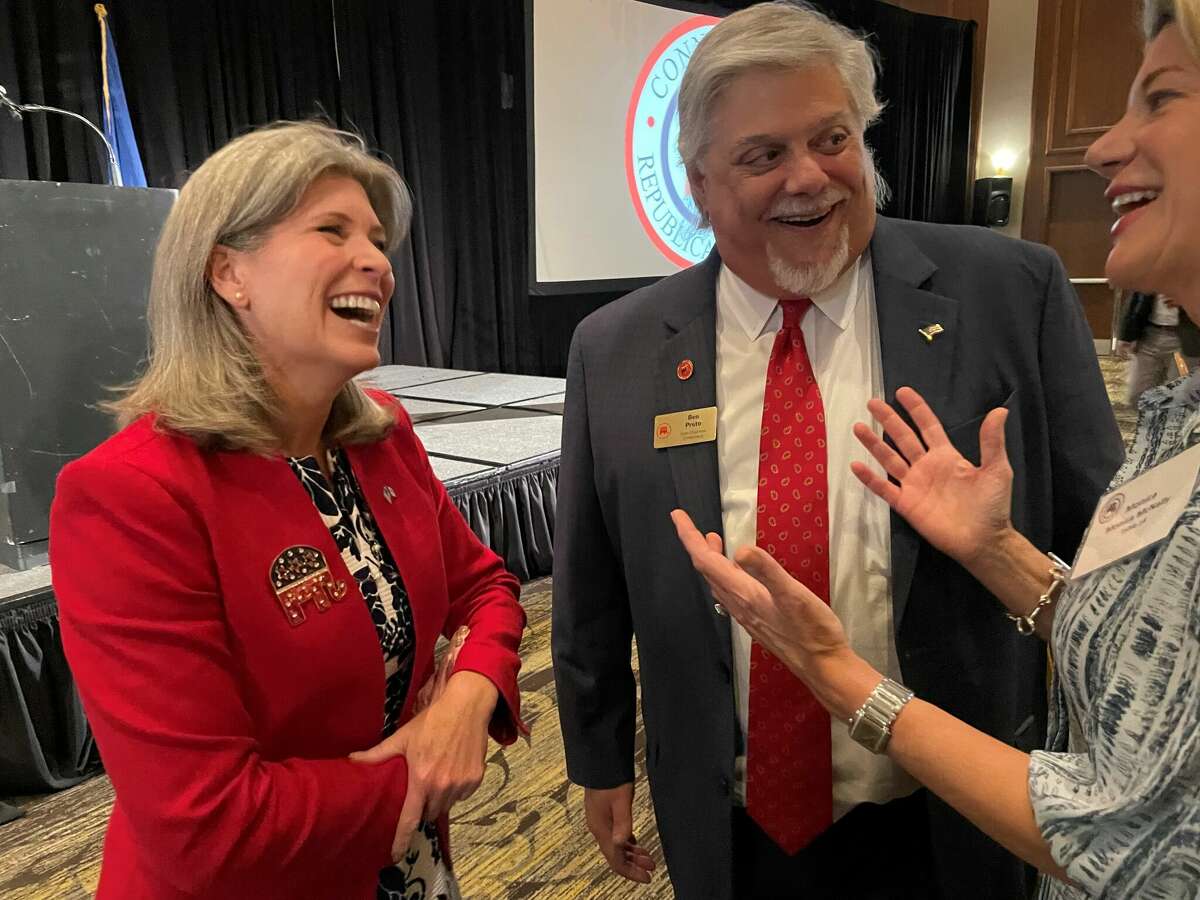 U.S. Sen. Joni Ernst of Iowa shares a laugh with Connecticut Republican Party Chairman Ben Proto and Darien First Selectman Monica McNally at the 43rdÂ  Annual Prescott Bush Awards Dinner in Stamford. Ernst gave the keynote address at the GOP fundraiser Thursday night.