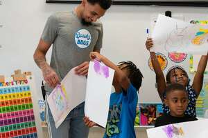 Former UConn star spends time at arts academy for youth