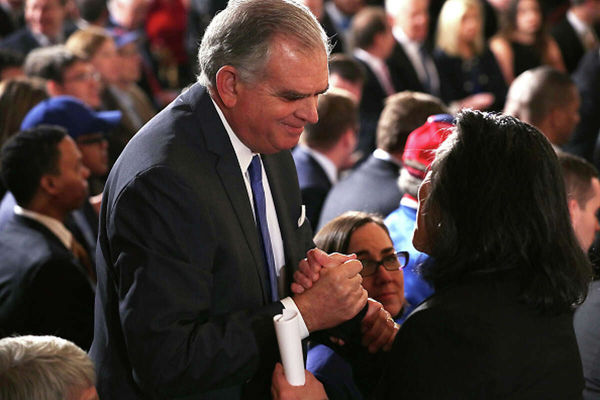Former Transportation Secretary Ray LaHood greets White House Director of Public Engagement Tina Tchen during a celebration of the Major League Baseball World Series champion Chicago Cubs in 2017.
