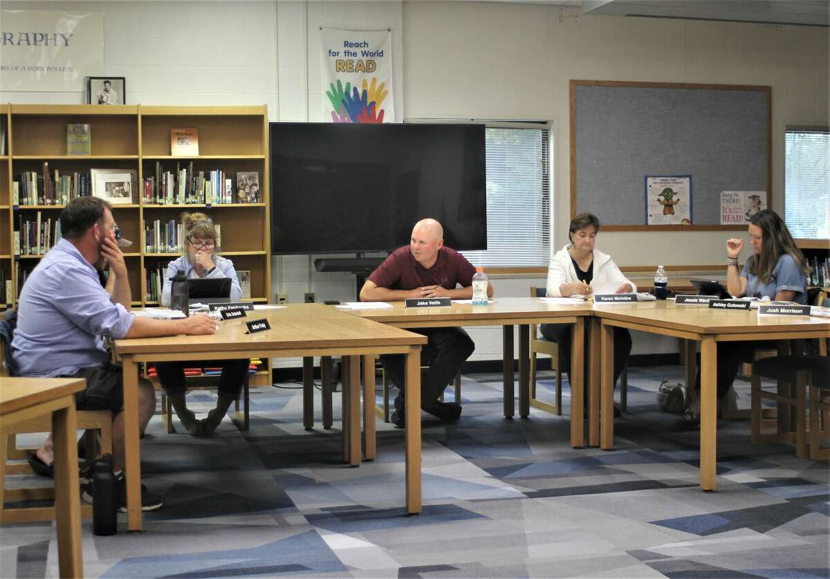 Kaleva Norman Dickson superintendent Jakob Veith (center) and the school board conduct a meeting Thursday.
