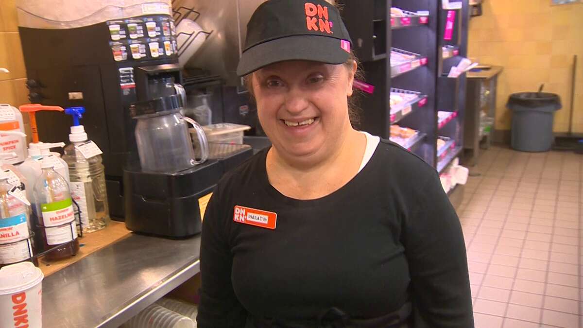 Coffee with a smile: Woman scores dream job working at Dunkin'