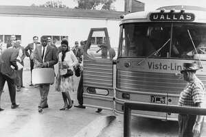 Abbott's migrant buses compared to 1962 'Reverse Freedom Rides'