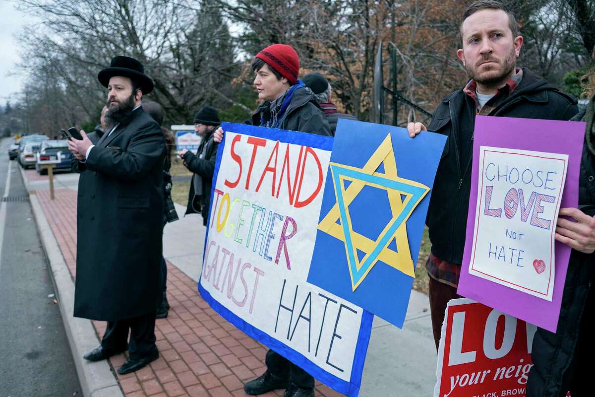 People speak out against antisemitism in 2019 in New York following a stabbing Saturday night during a Hanukkah celebration. Three years later, antisemitism is on the rise.