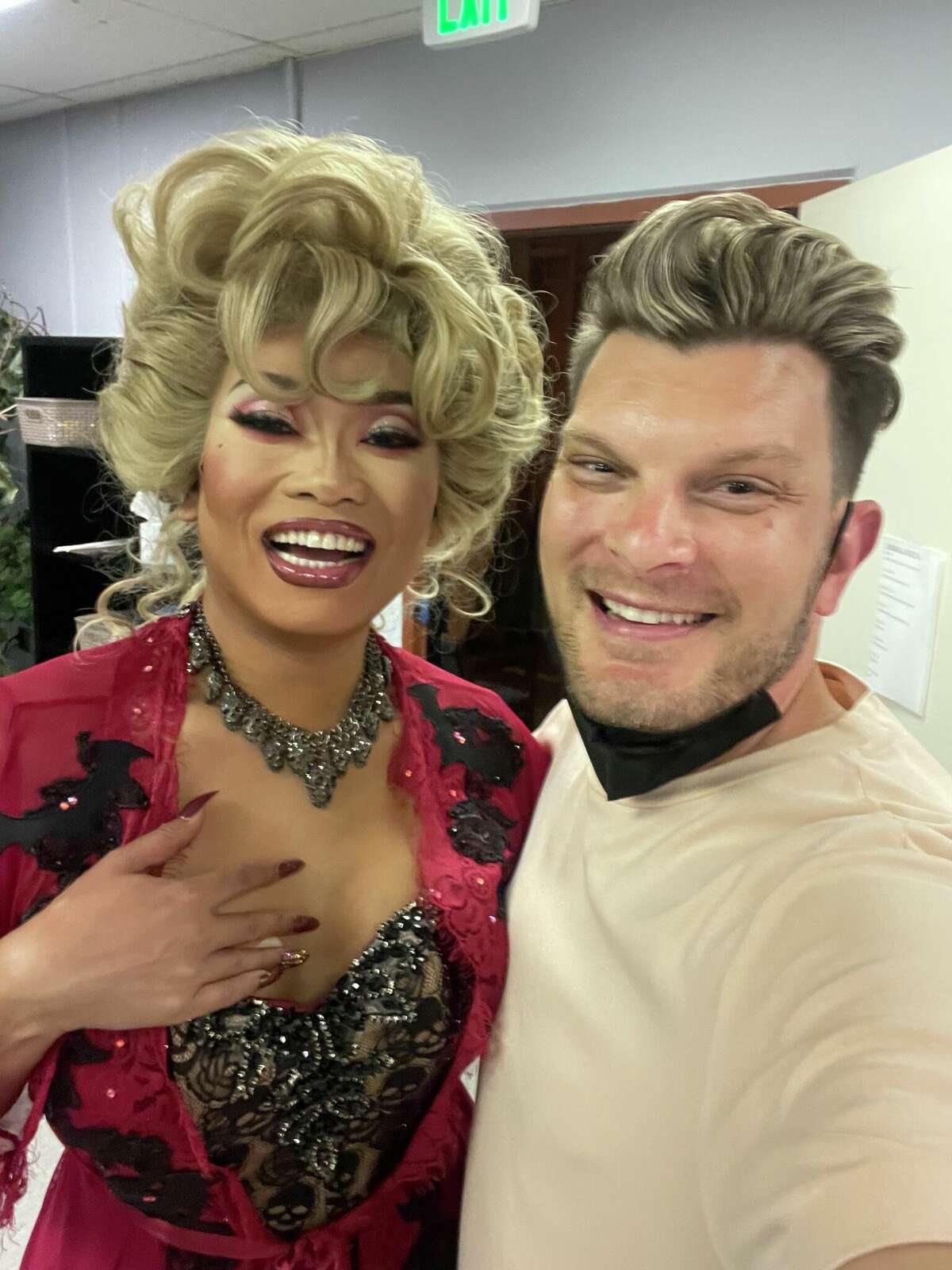 Justin poses with RuPaul's Drag Race contestant Jujubee (left).