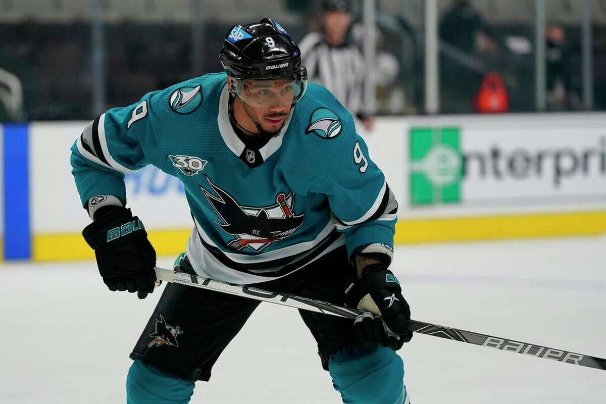 FILE - In this May 12, 2021, file photo, San Jose Sharks' Evander Kane (9) during an NHL hockey game against the Vegas Golden Knights in San Jose, Calif. The NHL has suspended Kane for 21 games for submitting a fake COVID-19 vaccination card. The league announced the suspension without pay on Monday, Oct. 18, 2021, and said Kane will not be eligible to play until Nov. 30 at New Jersey. (AP Photo/Jeff Chiu, File)