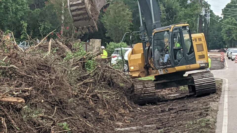 The Harris County Pct. 4 Parks Division, shown here in September 2021, building a trail connecting Burroughs Park to the Ann Snyder Trail Head in The Woodlands. The bond measure would fund park projects in in each of the county's four precincts.