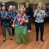 Seniors dance to the music of the live band, Coconuts, during a luau at the Shelton Senior Center on September 16, 2022.