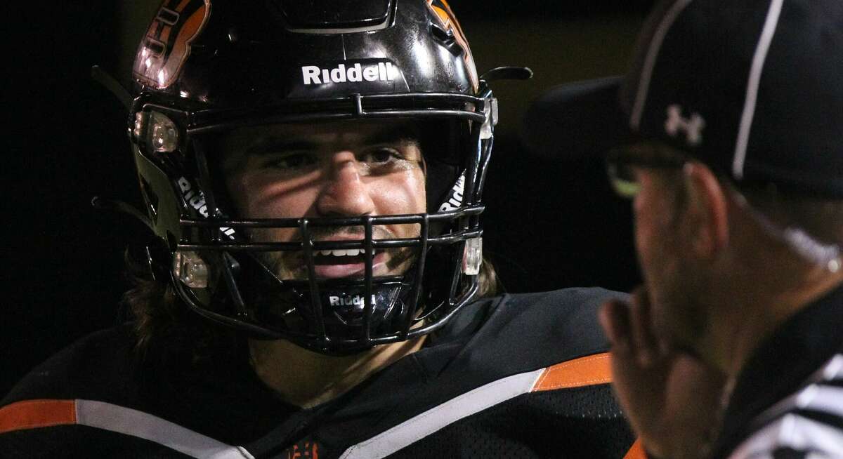 Beardstown's Owen Quigley talks to the ref during a break in the action Thursday night.