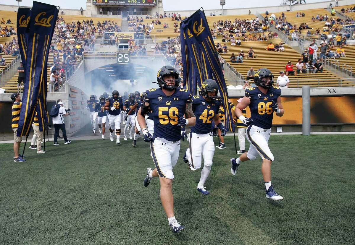 Spencer Lovell (54), Nate Rutchena (42), Jeffrey Johnson (86) and their teammates will try to extend Cal’s season-opening winning streak to three games when the Bears face Notre Dame in South Bend, Ind., at 11:30 a.m. Saturday. ( Channel: 11Channel: 3Channel: 8)