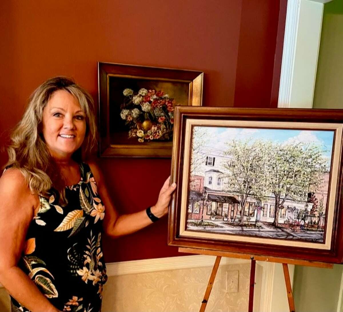 A 28-year resident of Ridgefield, Annie Caravelli has focused a lot of her artwork on creating Ridgefield-related paintings, such as the one in this photograph.