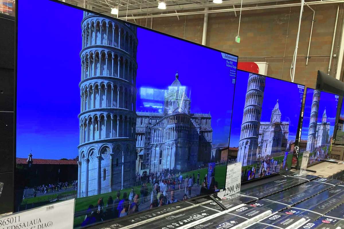 Buy now, pay later loans allow users to pay for items such as new sneakers, electronics — like these 65-inch TVs — or luxury goods in installments. But as the industry grows, more users are stacking loans and finding them harder to pay off.