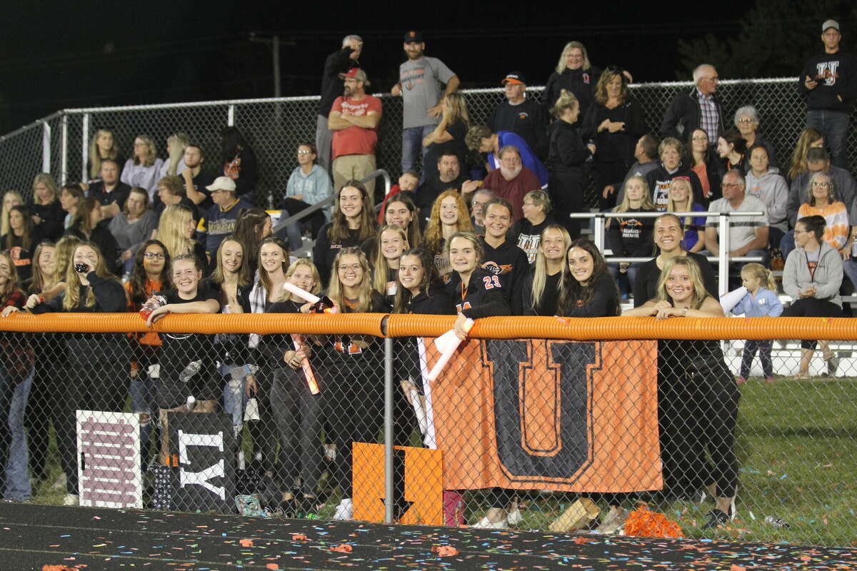 The Ubly student section cheers on their Bearcats.