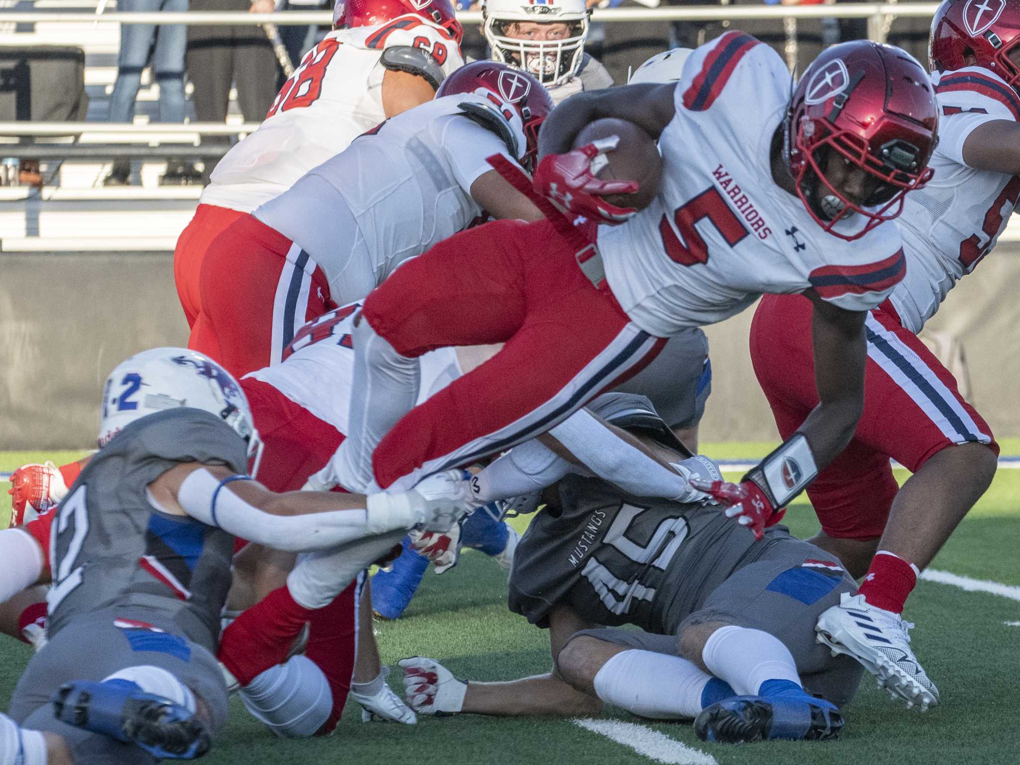 High-Scoring Offenses Collide When Arlington High, Southlake Carroll Meet  at Frisco's Star