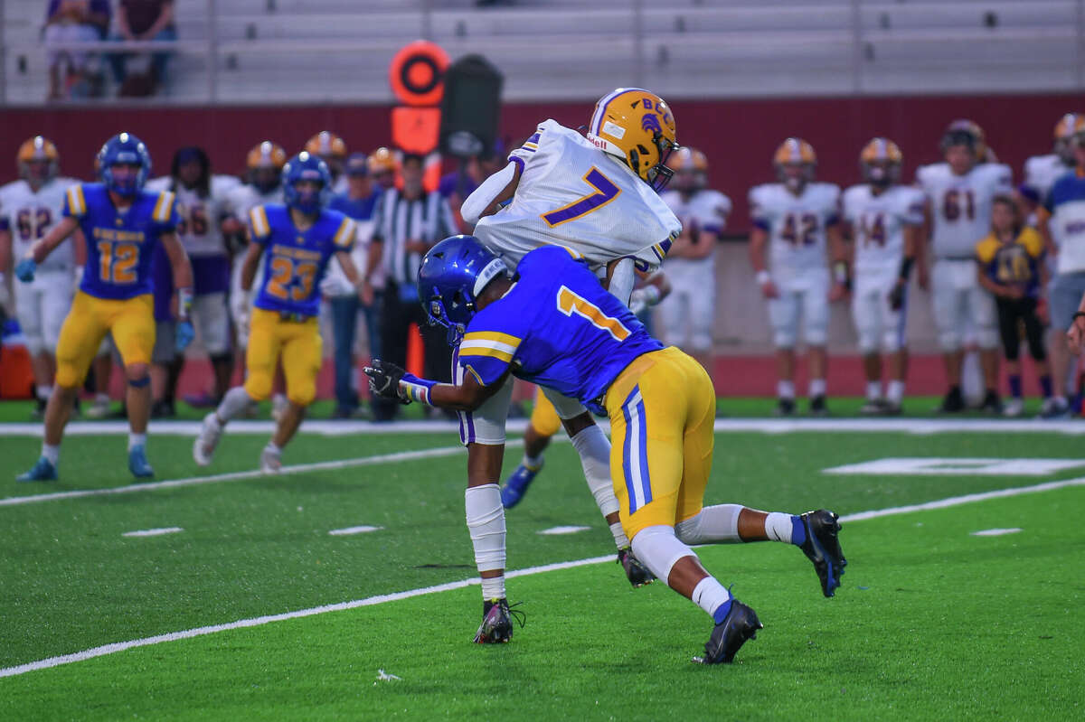Midland High's Jason Davenport makes a tackle during Friday's game against Bay City Central, Sept. 16, 2022.