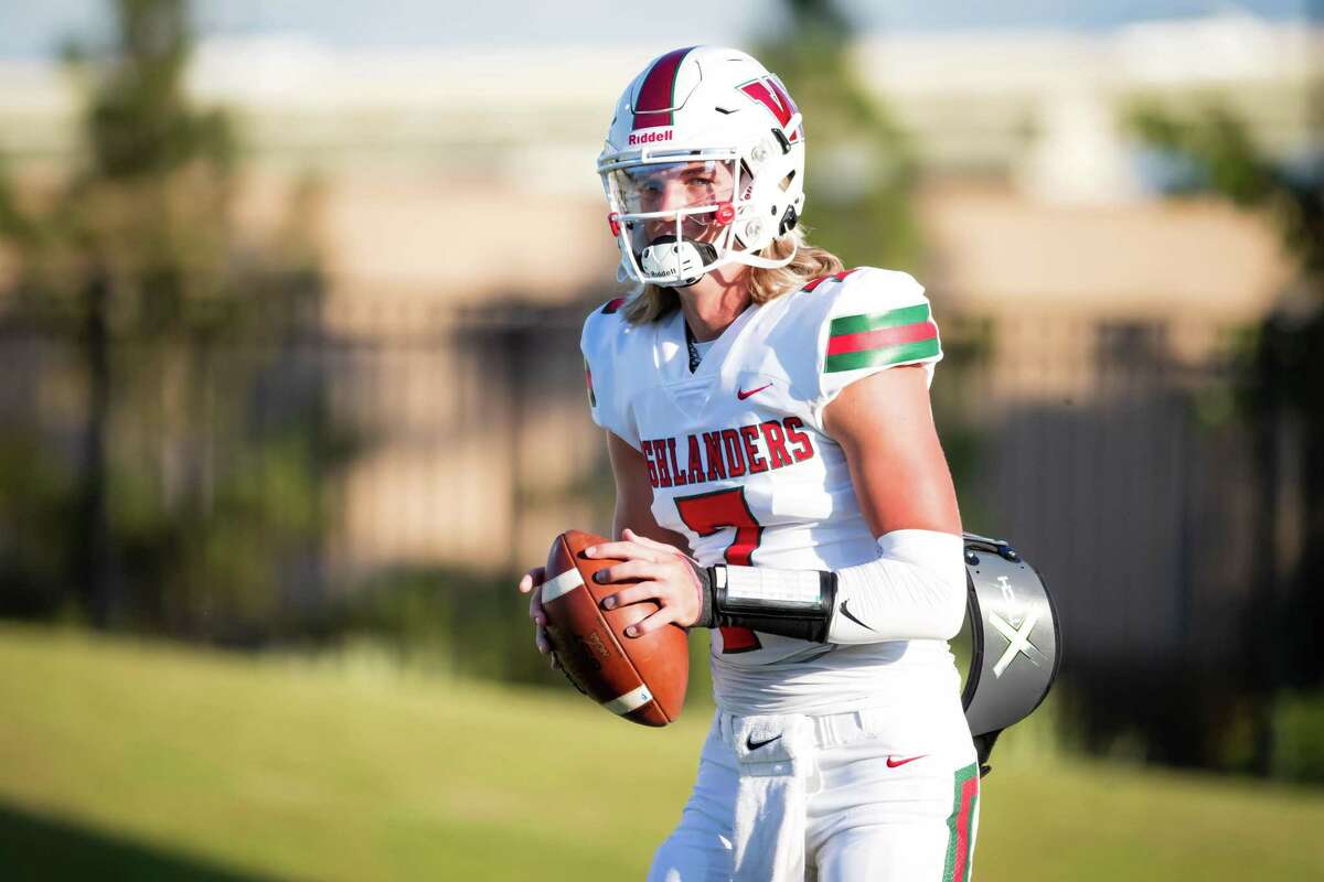 The Woodlands quarterback Mabrey Mettauer (7) is pictured on the field during pregame warmups before a district high school football game between The Woodlands and New Caney Friday, Sep 16, 2022, in New Caney.
