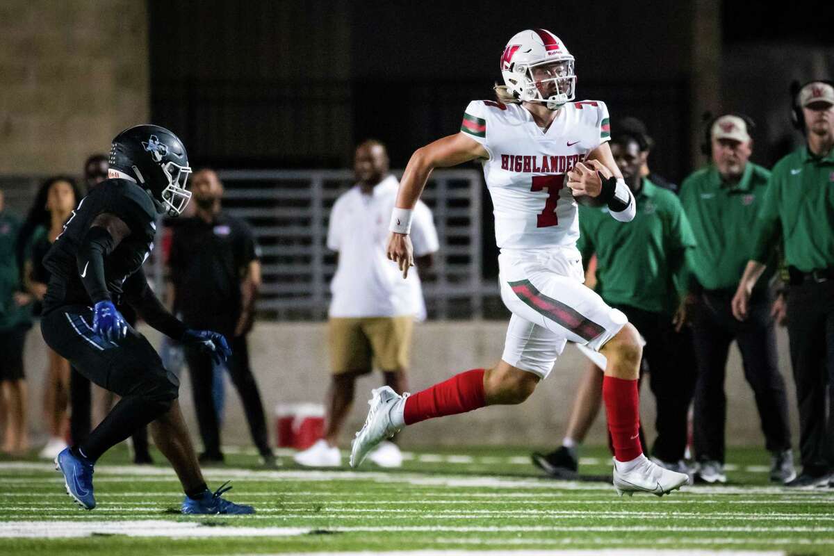 The Woodlands quarterback Mabrey Mettauer (7) has a first down run called back for illegal shift in a district high school football game between The Woodlands and New Caney Friday, Sep 16, 2022, in New Caney.