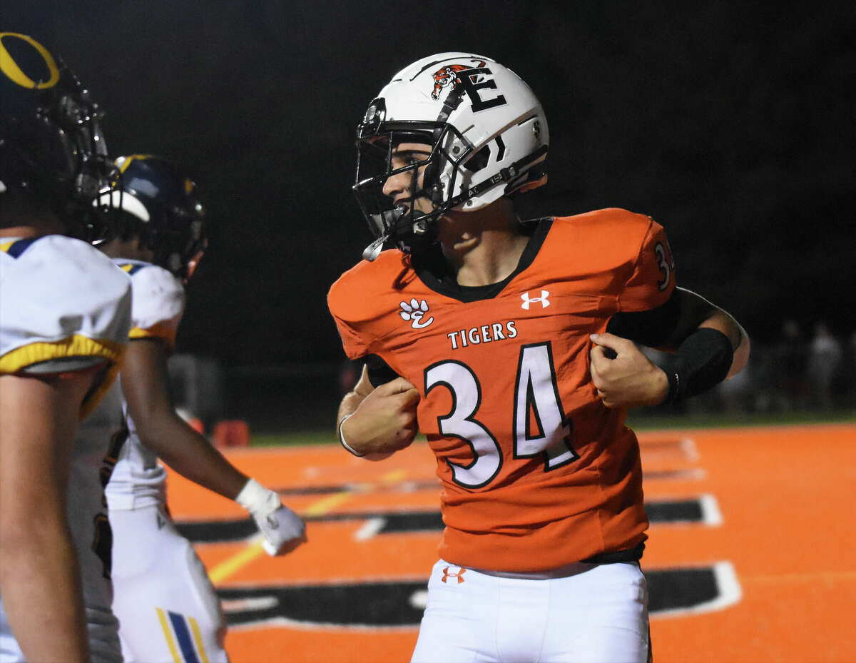 Edwardsville's De'Shawn Larson celebrates a touchdown against O'Fallon on Friday in Southwestern Conference action inside the District 7 Sports Complex in Edwardsville.