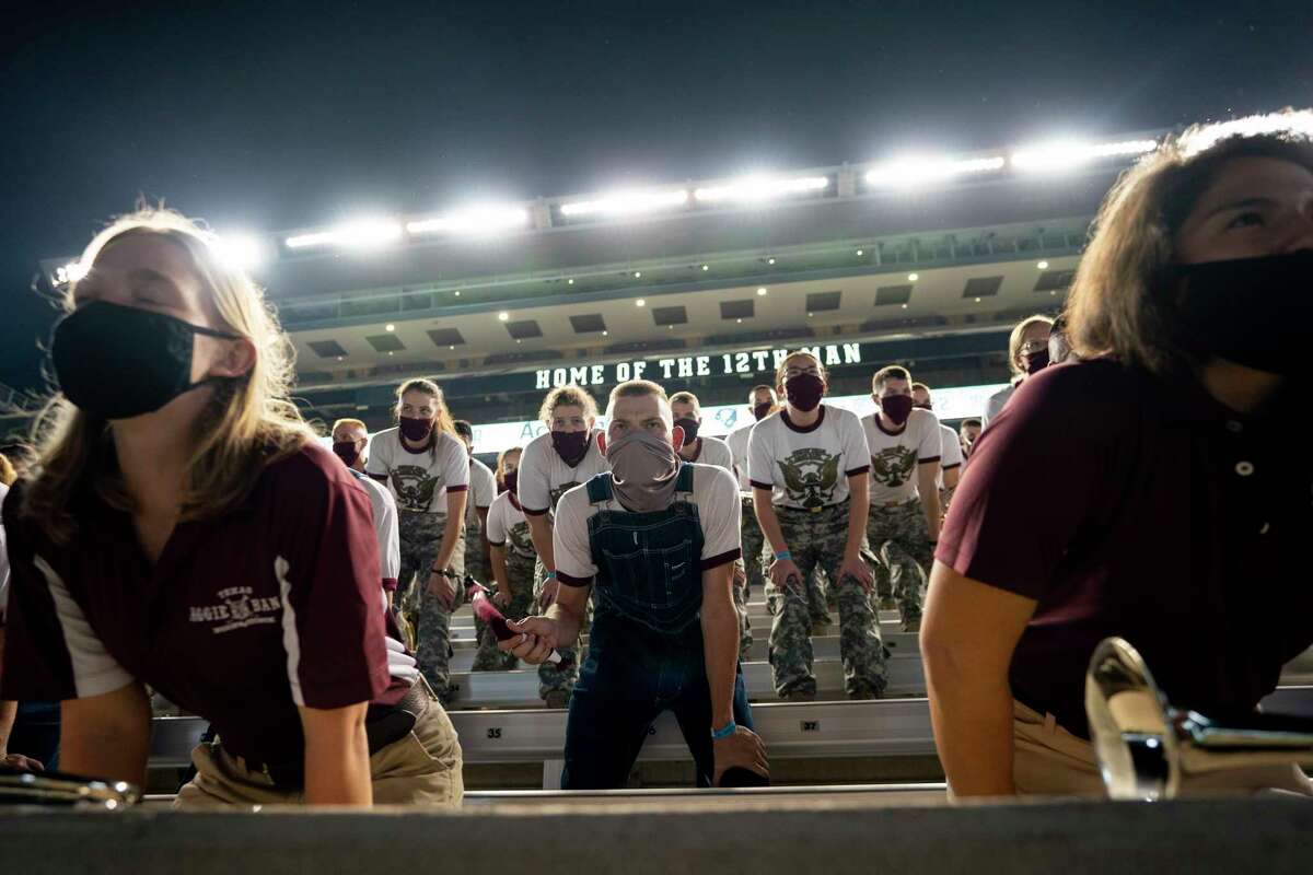 Members of the Texas A&M Corps of Cadets Band practice yells inside of Kyle Field, College Station, Texas as part of the first Midnight Yell Practice this season early Saturday, Sept. 26, 2020.