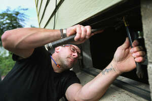 HomeFront volunteers help repair CT family's home