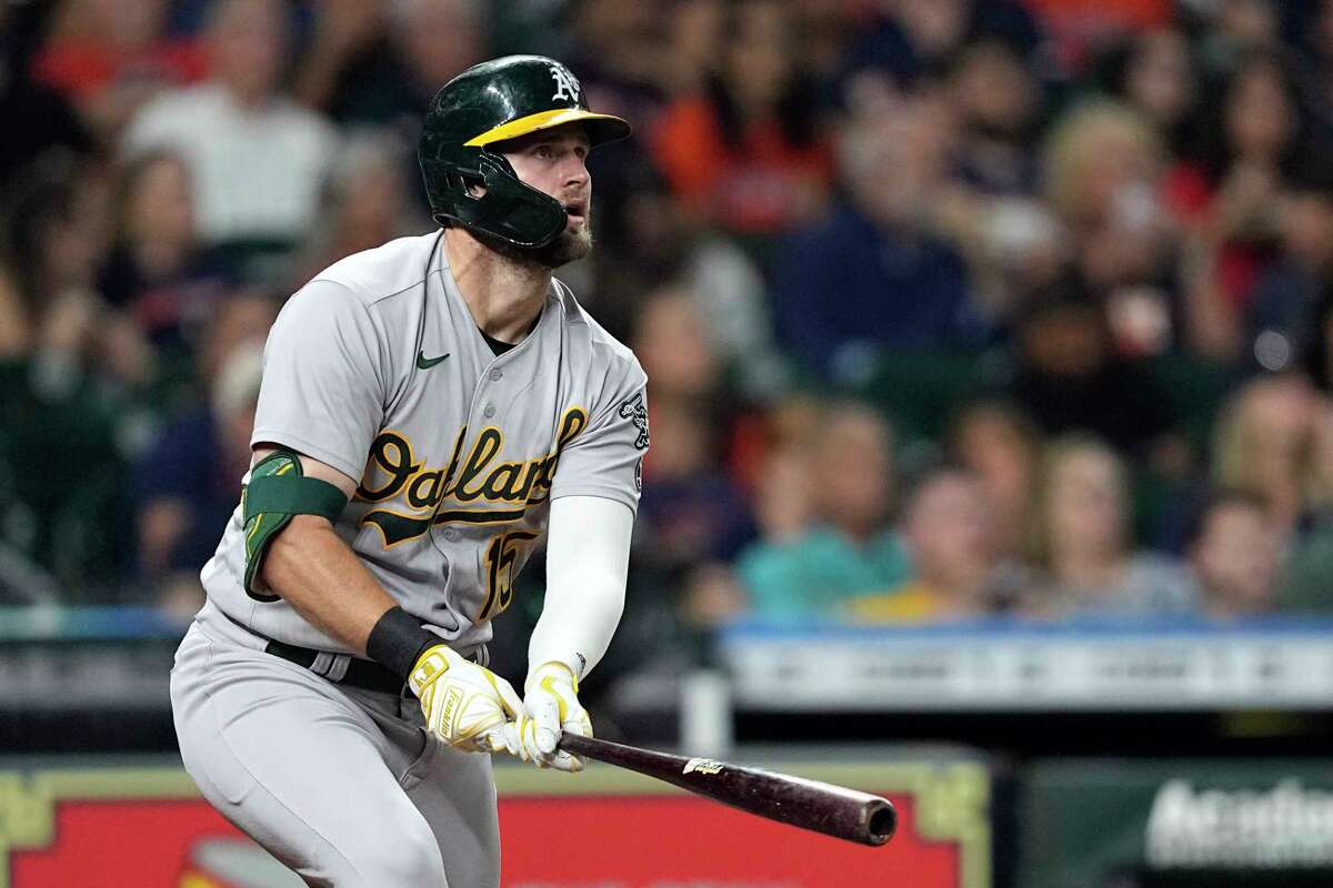 Oakland Athletics' Seth Brown watches his three-run home run against the Houston Astros during the fifth inning of a baseball game Saturday, Sept. 17, 2022, in Houston.