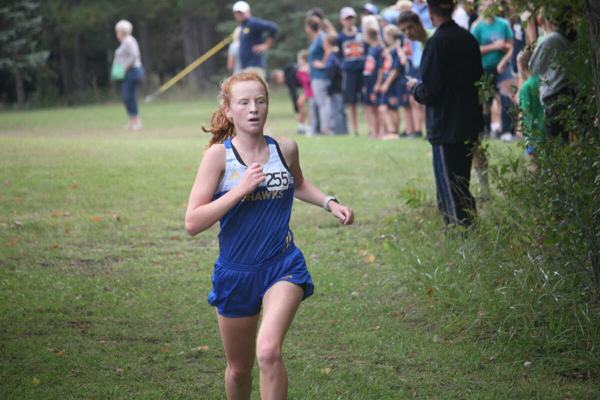Morley Stanwood's Miranda McNeil heads to the finish line first in the Evart Invitational.