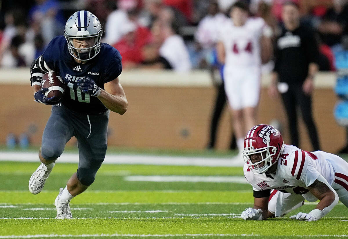 Rice Owls wide receiver Luke McCaffrey (10) gains 16 yards on a catch and run in the second quarter of a football game against the Louisiana Ragin Cajuns Saturday, Sept. 17, 2022, in Houston.