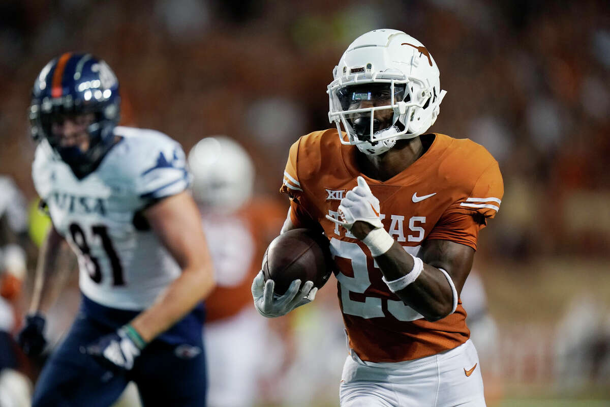 Texas defensive back Jahdae Barron (23) returns an interception 44 yards for a touchdown in last Saturday's 41-20 win over UTSA. 