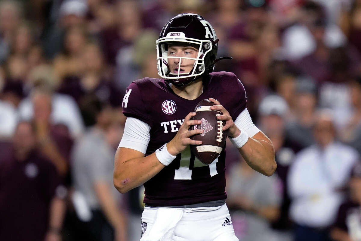 Texas A&M quarterback Max Johnson looks for a receiver during the first quarter of the team's NCAA college football game against Miami on Saturday, Sept. 17, 2022, in College Station, Texas.