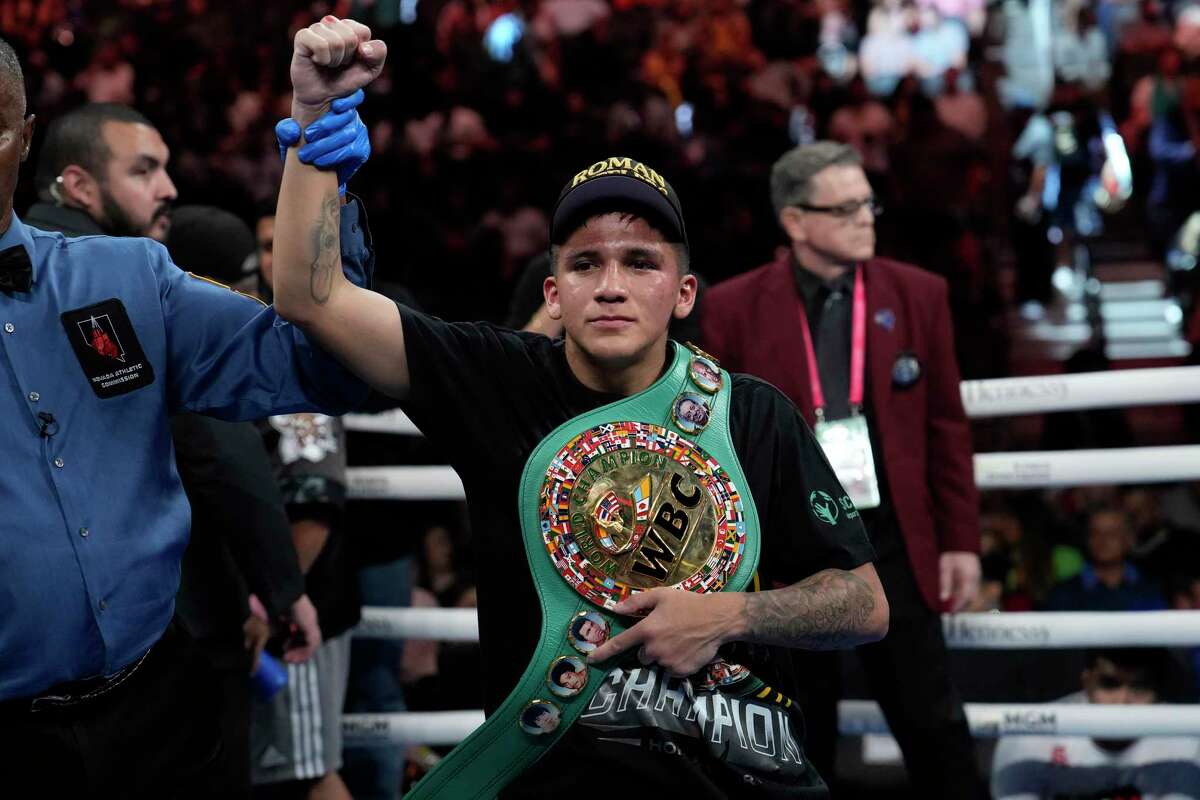 Jesse Rodriguez celebrates his win over Israel Gonzalez by unaminous decision after their super flyweight title boxing match, Saturday, Sept. 17, 2022, in Las Vegas. (AP Photo/John Locher)