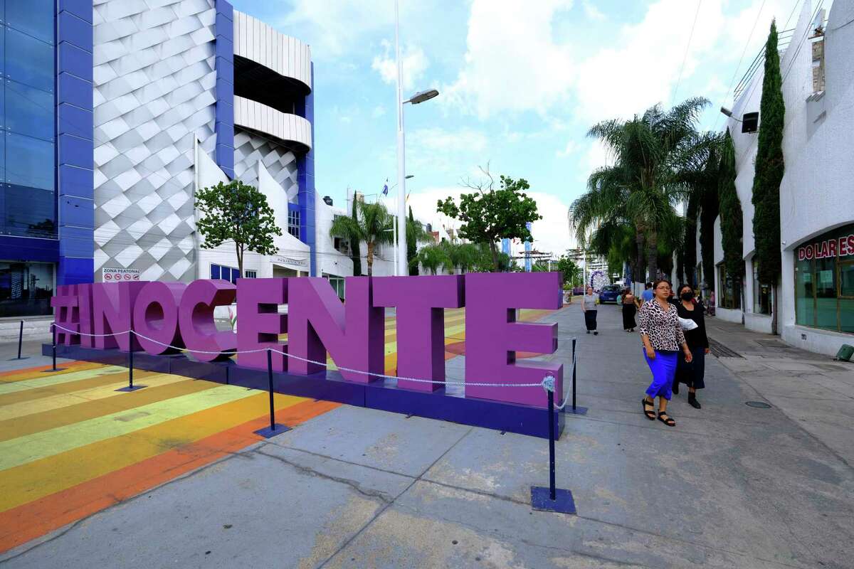 A sculpture hashtag that spells out the English word for innocent in reference to church leader Naason Joaquin Garcia, stands in a pedestrian walkway that leads to the La Luz del Mundo or Spanish for The Light of the World flagship temple, in Guadalajara, Mexico, Saturday, Aug. 13, 2022. Garcia, 53, was arrested in 2019 in California. He initially faced more than 20 charges, but most were dismissed after a plea deal with prosecutors. He is currently serving a 16-year sentence in a Los Angeles prison after pleading guilty to sexually abusing minors.