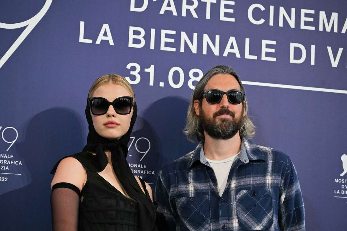 British actress Mia Goth and US director Ti West pose on September 3, 2022 during a photocall for the film "Pearl."