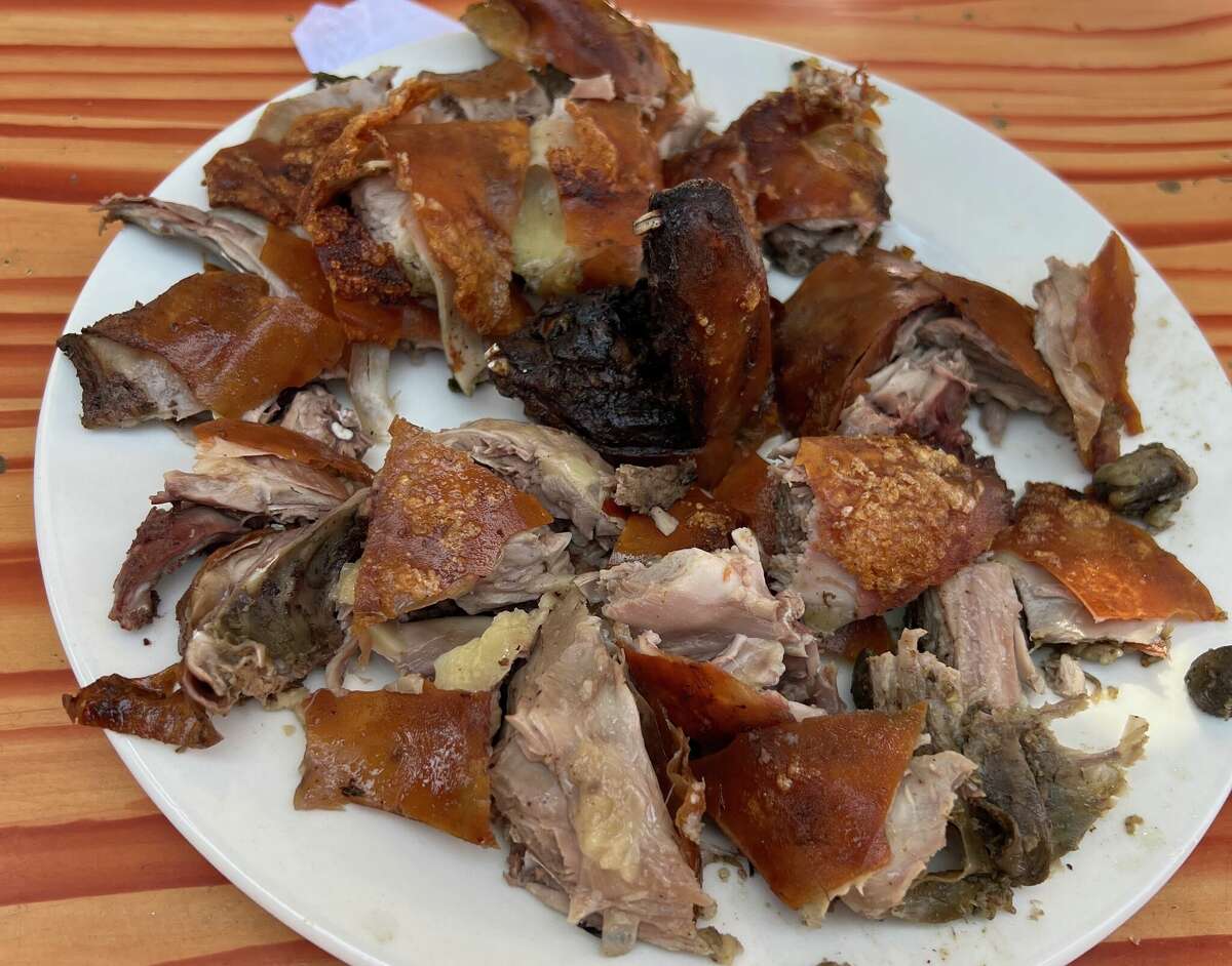 A plate of roasted guinea pig, or cuy, which is a delicacy across Peru. The animals are frequently eaten because of their abundant population and the protein their meat contains.